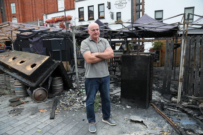 Bob McCoubrey, owner of Mourne Seafood Bar, outside his destroyed outdoor area. Picture by Hugh Russell