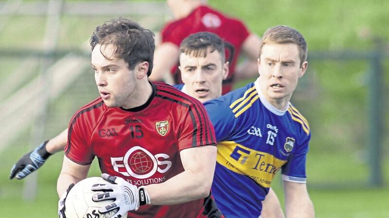Down&rsquo;s Cory Quinn gets away from Tipperary&rsquo;s Brian Fox during yesterday&rsquo;s Division Three clash in Clonmel. Picture: Louis McNally 