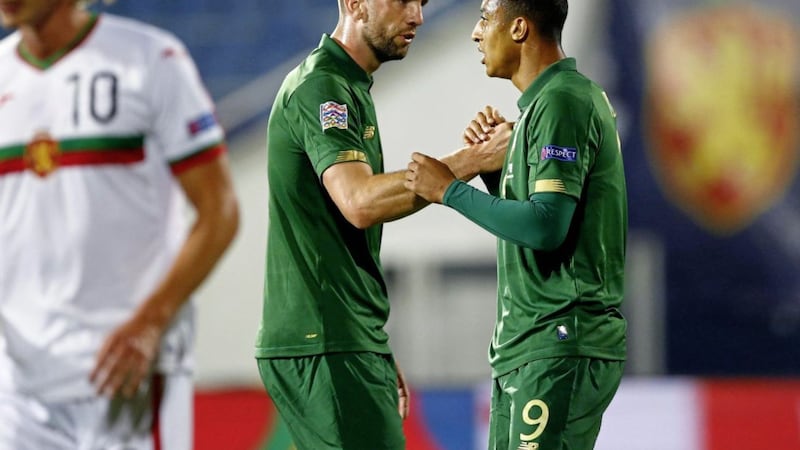 Shane Duffy (left) was Ireland&#39;s saviour as he struck in injury-time to earn a point in Sofia. The game marked the international debut of teenage striker Adam Idah (right) 