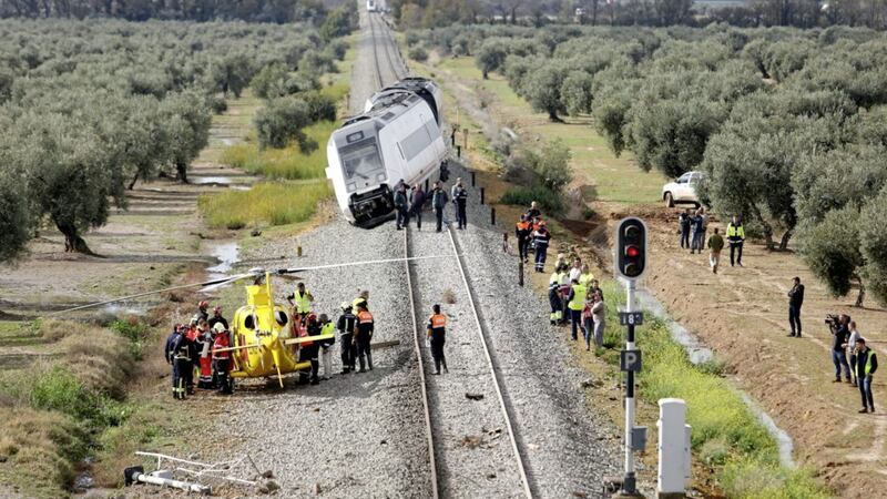 A train that derailed after part of a track became flooded near the town of Arahal, southern Spain PICTURE: Emergencias 112 Andalucia via AP 
