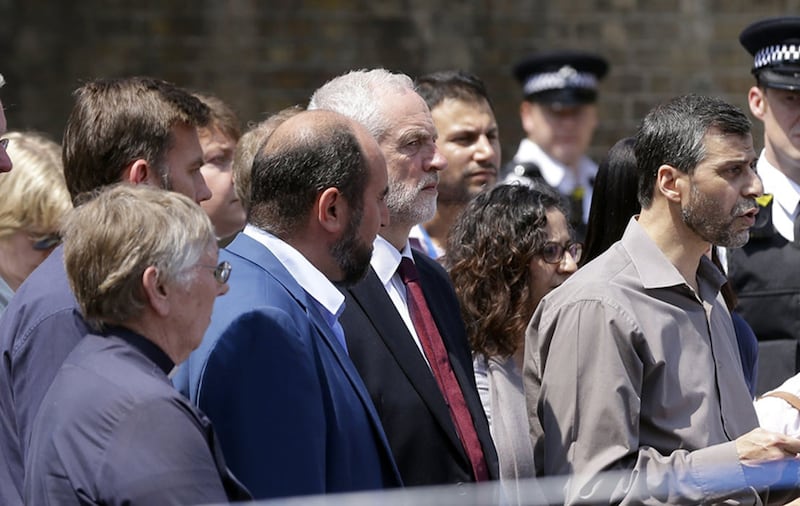 Labour Leader Jeremy Corbyn, centre, stands with religious and community leaders during a press conference near to Finsbury Park Mosque, the scene of an incident, in Finsbury Park, north London, Monday, June 19, 2017&nbsp;
