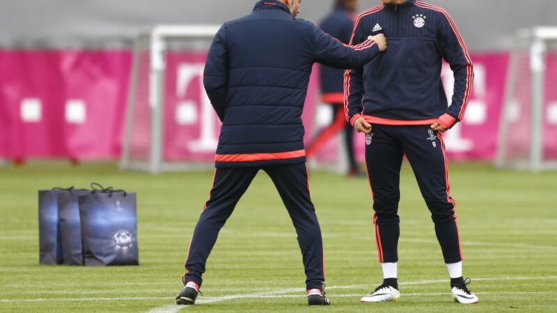 Bayern Munich head coach Pep Guardiola instructs Robert Lewandowski during a training session in Germany on Tuesday<br />Picture by AP