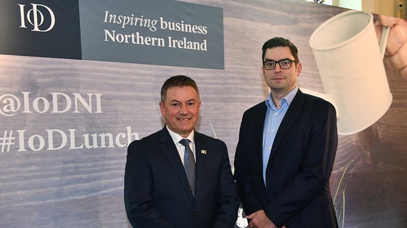 Launching the IoD&rsquo;s Leadership Dividend report at the organisation&rsquo;s Leadership Lunch held at Belfast City Hall, IoD NI Chairman Gordon Milligan (left) is joined by Andrew Webb, Economic Advisory Director at Baker Tilly Mooney Moore which compiled the study &nbsp;