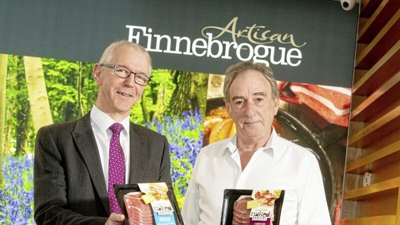 Brian Dolaghan, executive director of business and sector development, Invest NI with Denis Lynn, chairman of Finnebrogue Artisan. 