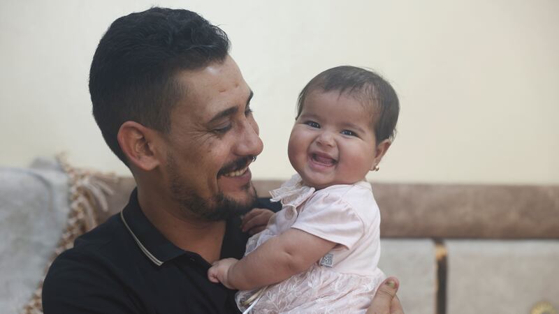 Afraa was born under the rubble of her family home (Ghaith Alsayed/AP)