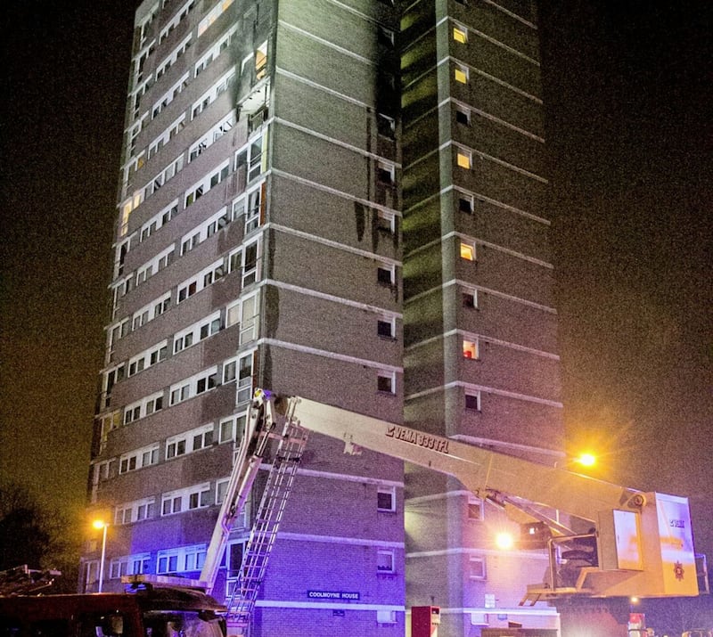 Emergency services at the scene of a fire at Coolmoyne House in Dunmurry, near Belfast, where residents have been evacuated from the building. PRESS ASSOCIATION Photo. Picture date:&nbsp; Liam McBurney/PA Wire...