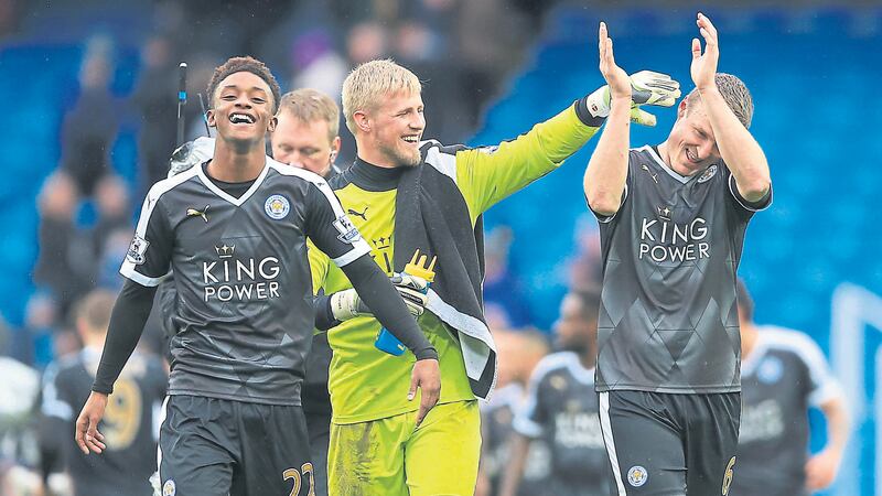 Leicester City keeper Kasper Schmeichel congratulates double goalscorer Robert Huth after their 3-1 win over Man City&nbsp;<br/><span class="Apple-tab-span" style="white-space:pre">				</span>