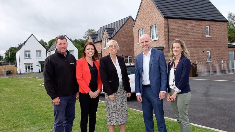 <strong>35 NEW HOMES:<br /></strong>Pictured at the official handover of homes to Connswater Housing&nbsp;from house builder BW Social Affordable Housing are from left&nbsp;to right: Rory Sharvin, BW Social Affordable Housing; Nadine McMahon, Connswater Housing; Jackie Hill, Connswater Housing, Vincent Bradley, BW Social Affordable Housing and Tammy Rountree, Connswater Housing&nbsp;