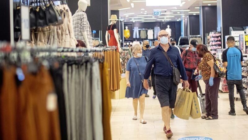 Customers wear face masks as they shop inside Primark in Oxford Street, London last month. The measure is to become compulsory in England on July 24 