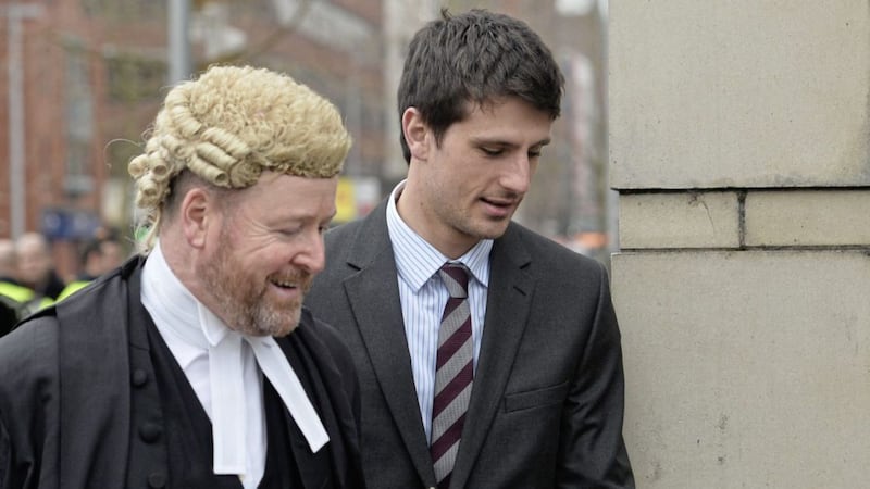 Blane McIlroy with legal counsel at Laganside Court. Picture by Pacemaker