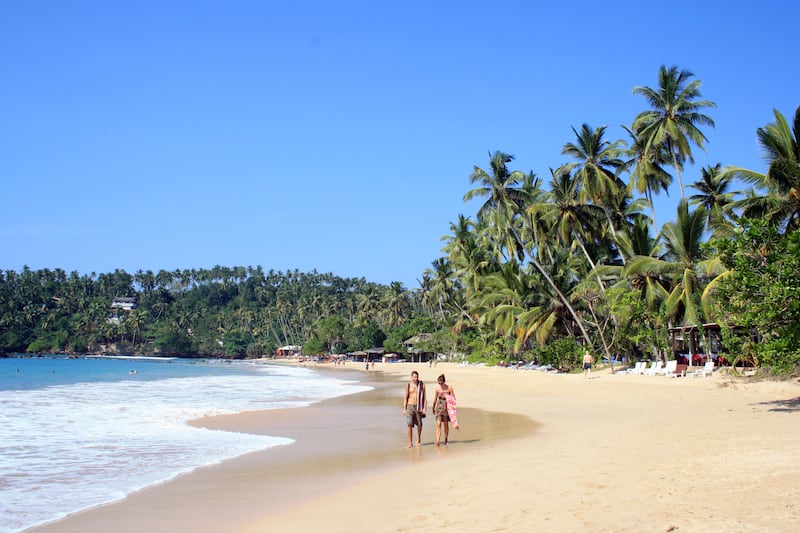 Beach in Mirissa, Sri Lanka (Alamy/PA)