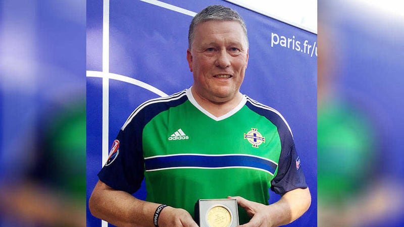 Jim Spratt from Belfast after accepting the Medal of the City of Paris on behalf of Northern Ireland fans for their sportsmanship during Euro 2016. Picture by Alex Britton, Press Association 