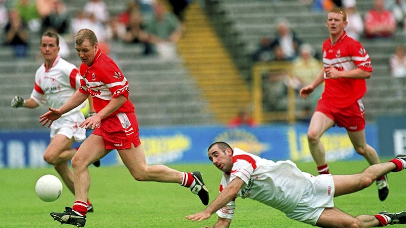 Derry's Johnny McBride in action against Tyrone's Declan McCrossan during the 2001 All-Ireland SFC quarter-final in Clones. Derry got the better of the Ulster champions that day in their second meeting of the year. Picture: Sportsfile