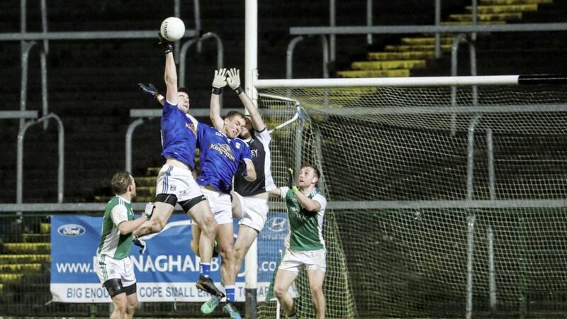 Cavan's Thomas Galligan fists over a point early in the second half of Saturday night's Division Two victory over neighbours Fermanagh. Picture by Donnie Phair