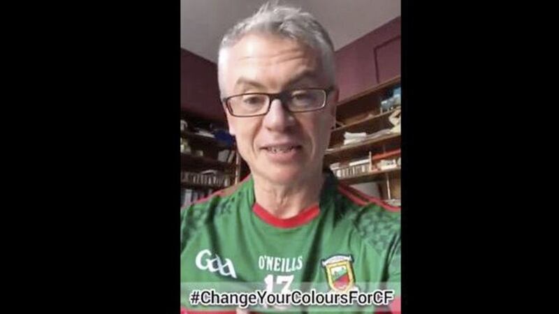 Joe Brolly has challenged DUP leader Arlene Foster to wear a GAA jersey in support of two cystic fibrosis charities 