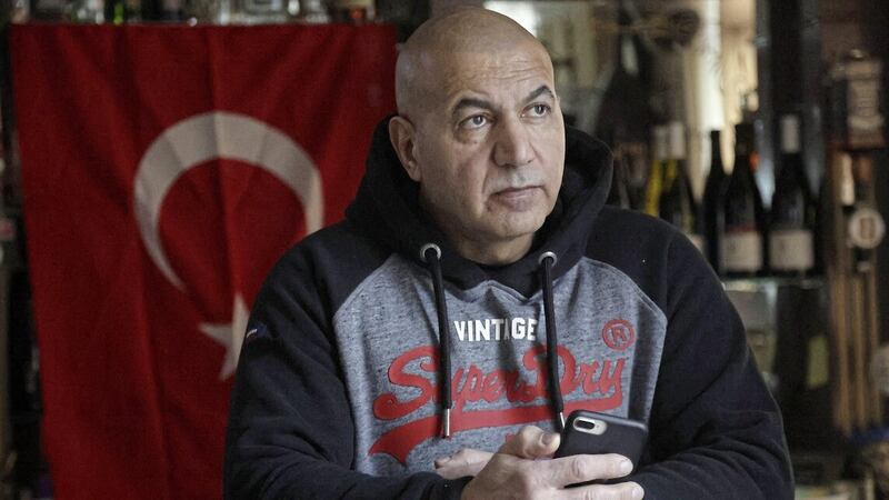 Baki Celik talks about his family in Turkey, who have been made homeless due to the earthquake. Picture by Hugh Russell 