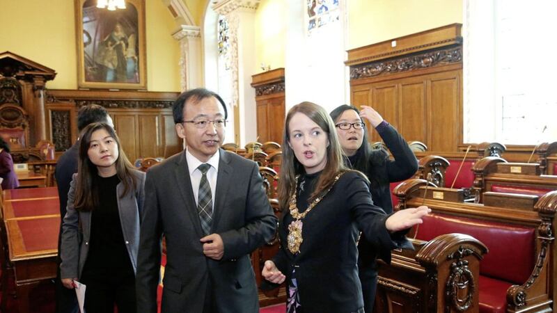 OPEN FOR BUSINESS: Belfast lord mayor Nuala McAllister shows Xiao Feng, secretary general of Shenyang Municipal Government, around the city hall yesterday during a three-day summit to improve business links between Northern Ireland and China					Picture: PressEye 