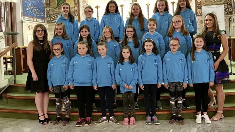 Julie O&#39;Neill, left and Grace Somerville, far right, with the school choir 