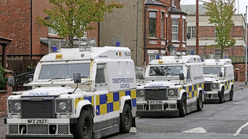 Police carry out a search of a property in the Cliftonville area of north Belfast No Byline. 