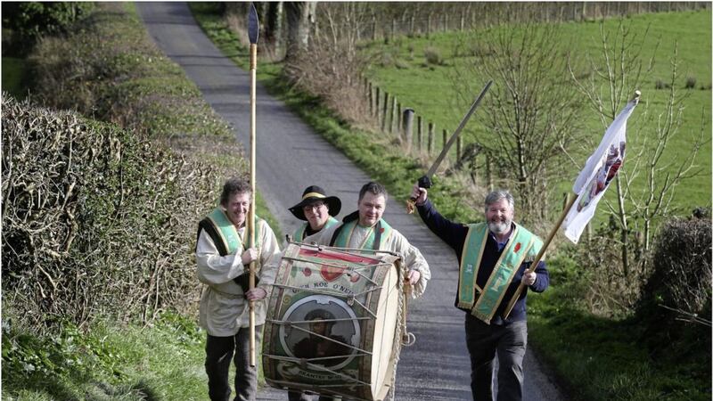 The historic &#39;Owen Roe&#39; Lambeg drum is carried by members of Tyrone AOH including president Gerry McGeough. Picture by Hugh Russell 