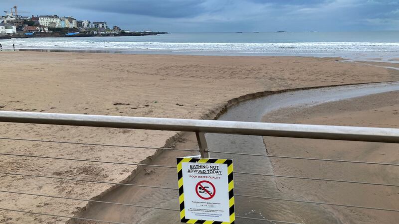 One of the signs at East Strand in Portrush advising people to stay out of the water. PICTURE: MAL MCCANN