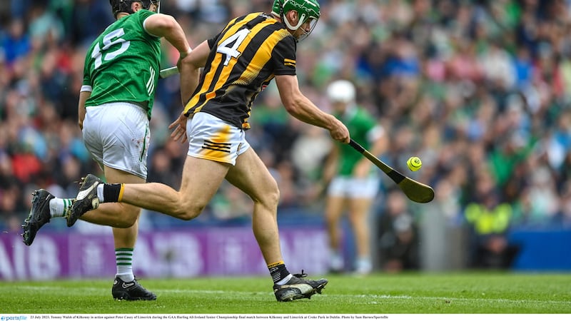 Tommy Walsh gets ahead of Peter Casey in this battle but the Limerick attacker gave the Cats defender a torrid time in the second half Picture by Sportsfile