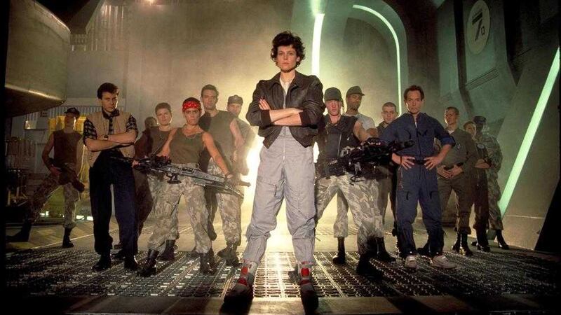 The cast of Aliens, with Sigourney Weaver (front, centre) sporting her trademark &#39;alien Stomper&#39; Reeboks 