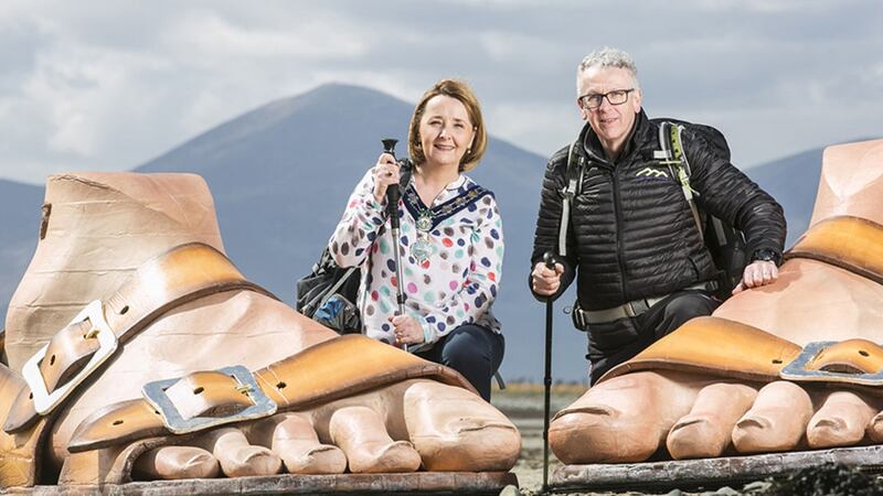 Pictured launching the Mourne International Walking Festival are Roisin Mulgrew, Chair of Newry, Mourne and Down District Council and Peter Rafferty, a mountain leader with Walk the Mournes 