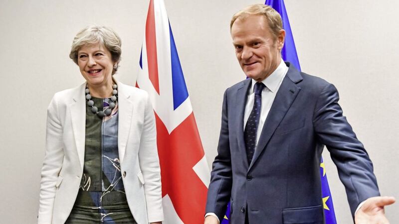 British Prime Minister Theresa May is welcomed by European Council President Donald Tusk. Picture by AP Photo/Geert Vanden Wijngaert 