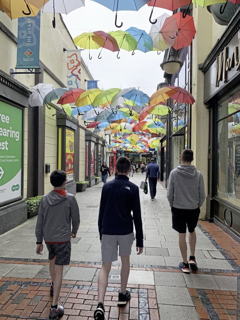 A perfect spot for Suzanne McGonagle to capture a photograph of her three sons under the colourful sky of umbrellas off the Kilkenny high street