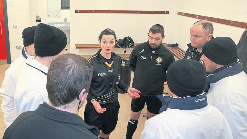 Maggie Farrelly speaks to her fellow officials before Wednesday&rsquo;s Dr McKenna Cup game between Fermanagh and St Mary's at Garvaghey<br/>Picture: Declan Roughan