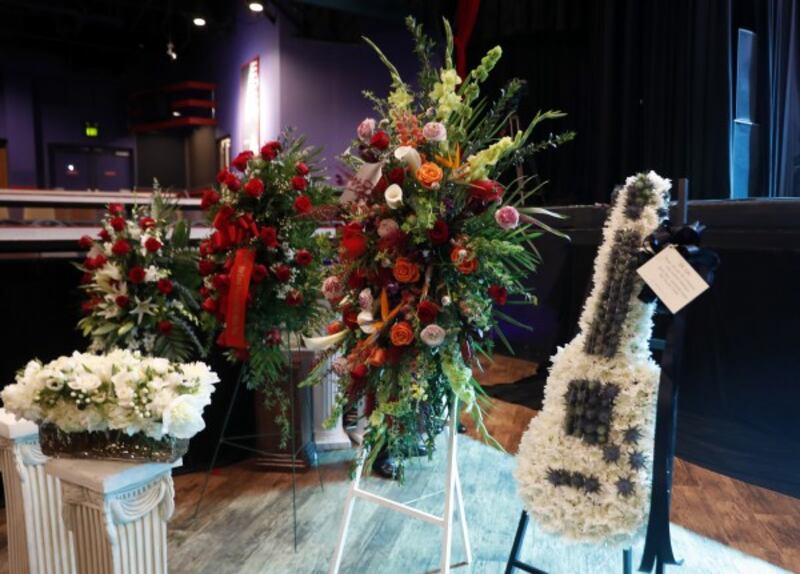 Flower arrangements at the service (Jeff Roberson/AP)