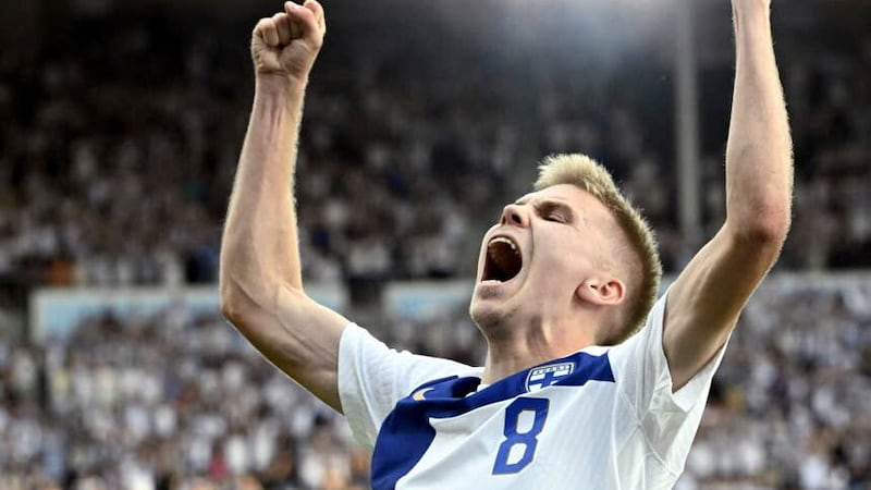 Oliver Antman of Finland celebrates his goal (Heikki Saukkomaa/Lehtikuva via AP)