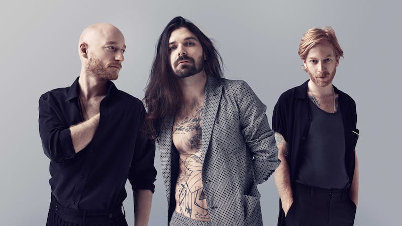 Biffy Clyro kicked off their show with the blistering Wolves of Winter setting the tone for an energetic performance against the looming, impressive backdrop of the shipyard &nbsp;