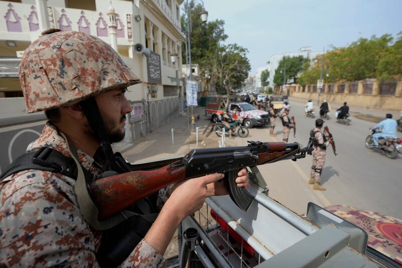 The bombings came despite the deployment of tens of thousands of police and paramilitary forces across Pakistan to ensure peace following a recent surge in militant attacks in the country (Fareed Khan/AP)