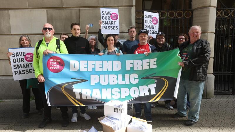Campaigners against changes to the SmartPass travel system pictured outside the Department for Infrastructure's offices in Belfast. Picture by Mal McCann