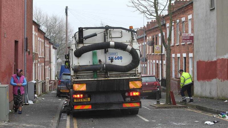 Clearing up in the Holylands area of south Belfast after St Patricks Day. Picture by Mal McCann 