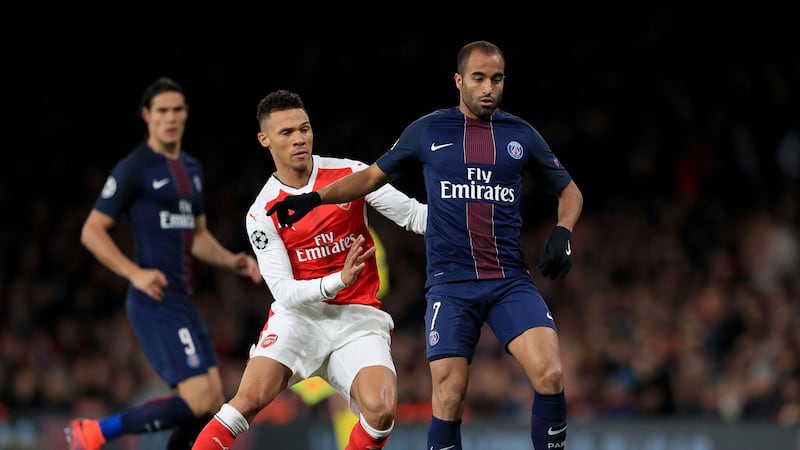 &nbsp;Lucas Moura (right) salvaged a point for PSG when his late header was bundled into the Arsenal goal by Alex Iwobi. Picture by PA