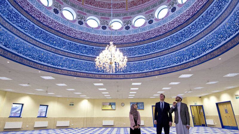 David Cameron during a visit to a mosque in Leeds as he warned Muslim women who fail to improve their English language skills could be deported. Picture by PA