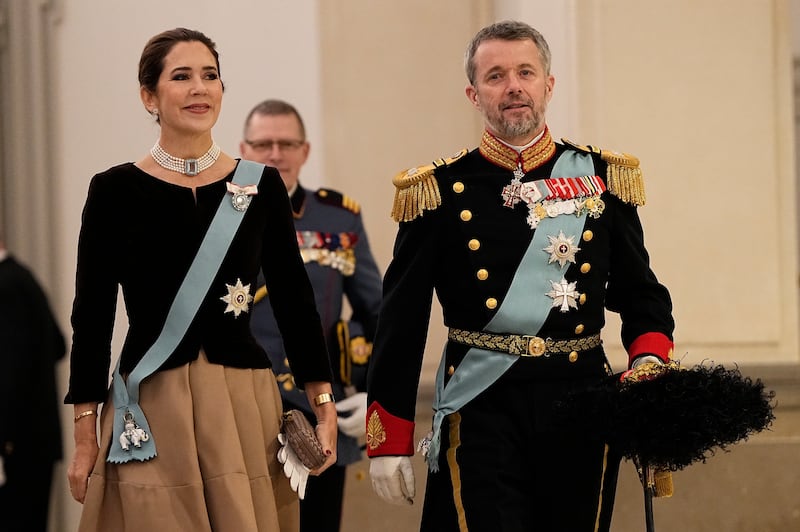 Denmark’s Crown Prince Frederik and Crown Princess Mary arrive to the traditional New Year’s fete at Christiansborg Castle in Copenhagen on Thursday (Mads Claus Rasmussen/Ritzau Scanpix via AP)