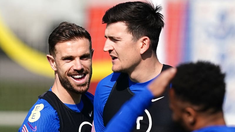 Harry Maguire (centre) insists any supporters who booed Jordan Henderson are not “real” England fans (Martin Rickett/PA)