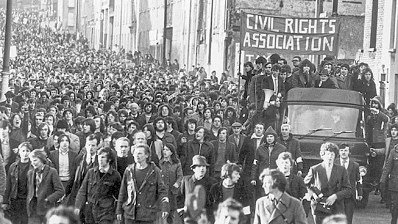 The civil rights march that ended as Bloody Sunday in Derry in January 1972; Britain still won&#39;t reveal the real motives for the killings by soliders 