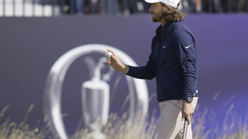 Tommy Fleetwood smiles after a birdie during his opening round of the Open Championship at Royal Liverpool