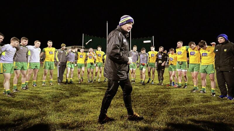 Declan Bonner,  having words with his squad, after a victory in his  first competive game in charge of Donegal, over Queen's University in a Dr McKenna Cup game in McCool Park. Photo Michael O'Donnell