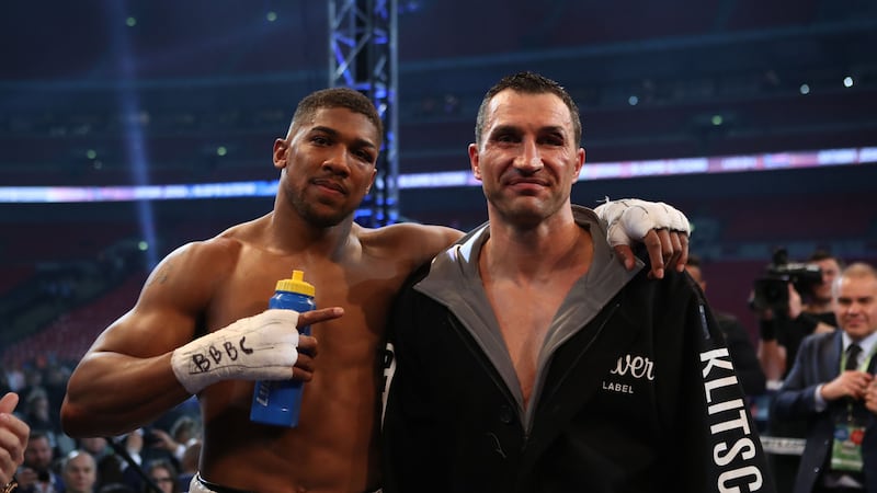 Anthony Joshua (left) post and Wladimir Klitschko following the IBF, WBA and IBO heavyweight title bout at Wembley Stadium, London