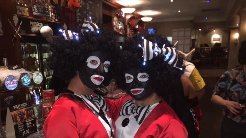 Wetherspoon has apologised after two women were admitted to a pub in Derry dressed as golliwogs 