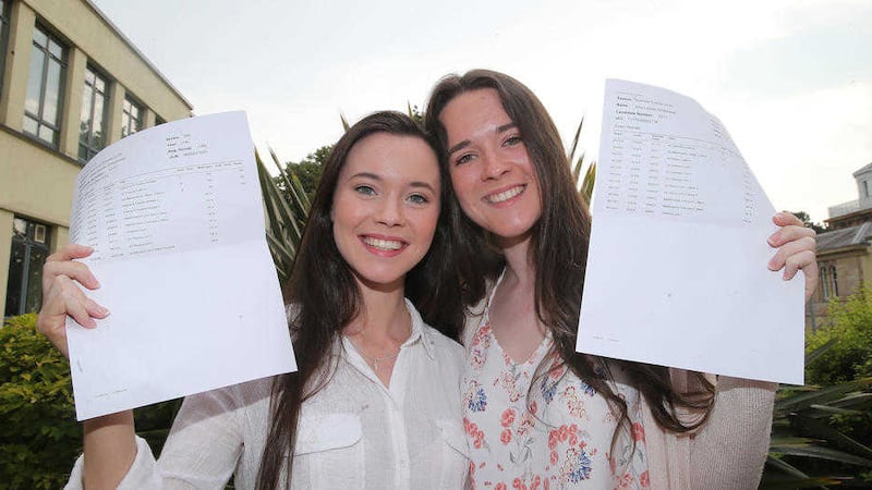 A+ grades for twins Ellen and Amy Whitehead at Dominican College Belfast. Picture by Hugh Russell.