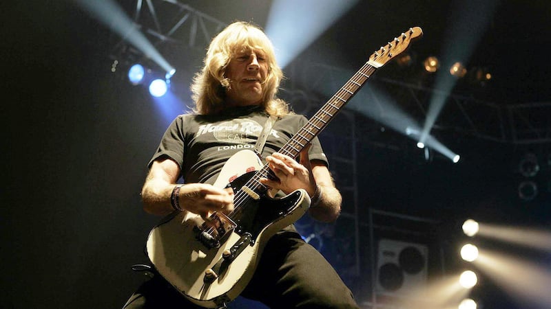 Status Quo's Rick Parfitt on stage, during their concert at Wembley Arena in London in 2006. Picture by Edmond Terakopian, Press Association