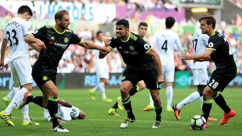 &nbsp;Chelsea's Diego Costa (centre) celebrates scoring his side's second goal of the game&nbsp;<br />Picture by PA
