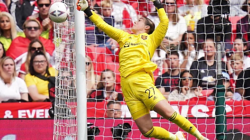 Manchester United goalkeeper Mary Earps makes a save (Adam Davy/PA).